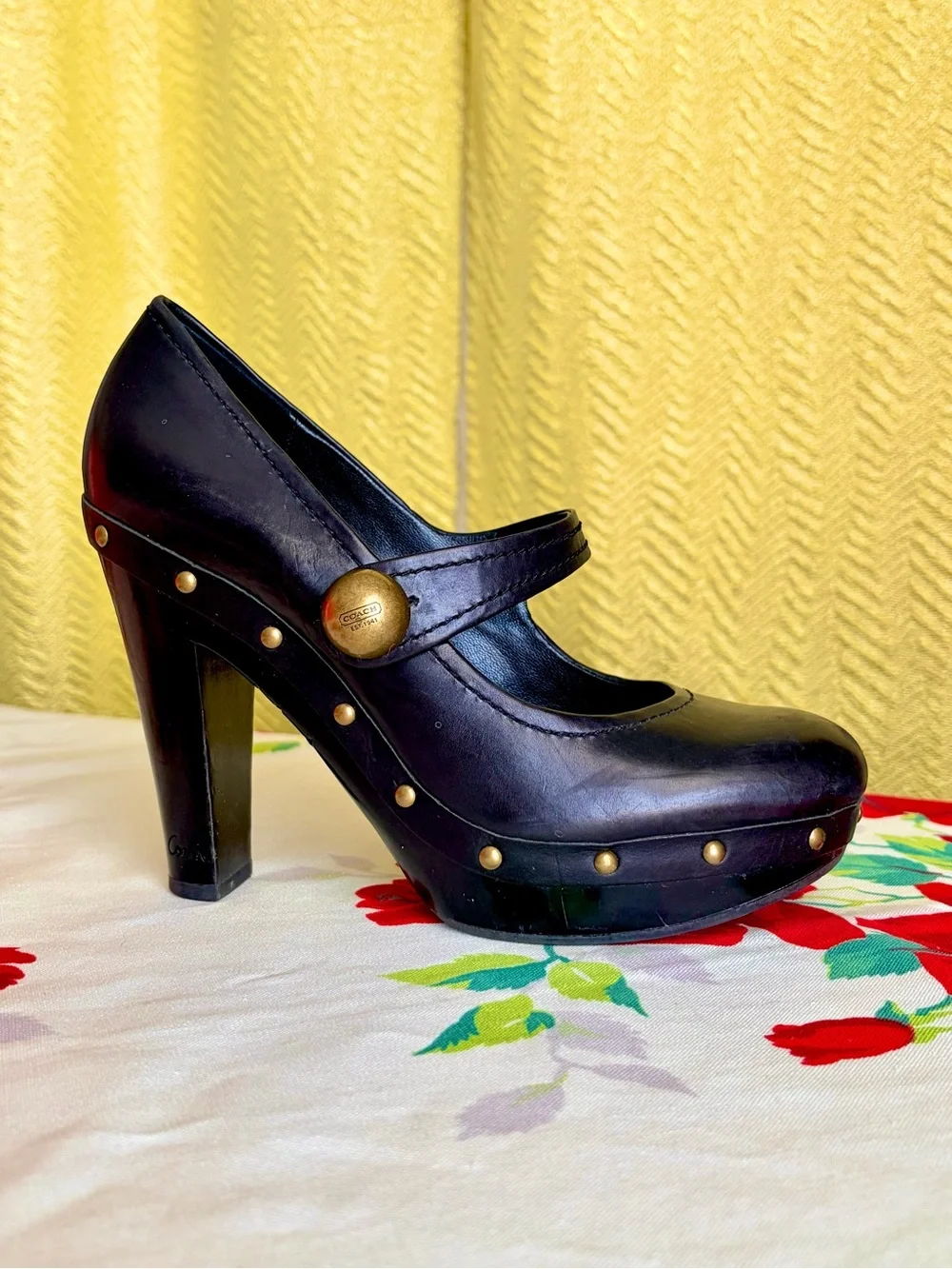 Coach sleek black
